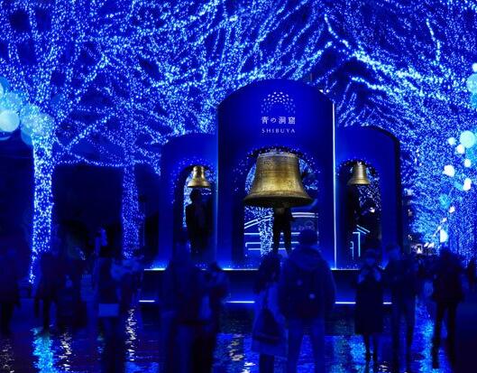 Blue LED light tunnels decorate winter streets in Shibuya, Tokyo, Japan